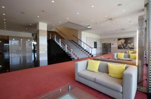 Posezení v ubytování Hotel de Guimaraes Business & SPA