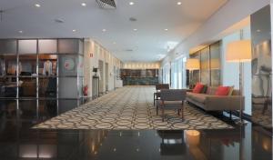 Posezení v ubytování Hotel de Guimaraes Business & SPA