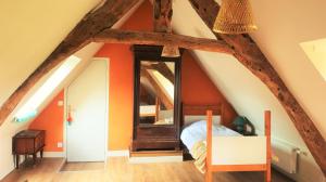 La Vieille Foulonnière : Chambres d'hôtes & Permaculture客房内的一张或多张床位