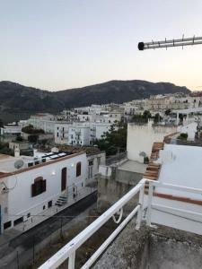 a view of a city with white buildings at Delizioso appartamento nel centro storico in Mattinata