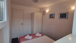 Ένα ή περισσότερα κρεβάτια σε δωμάτιο στο Apartment Mimice 4