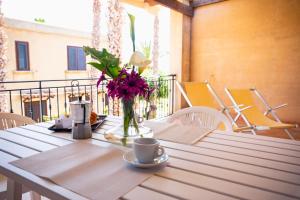 A balcony or terrace at Resort Santa Maria Hotel