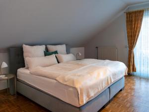 Postel nebo postele na pokoji v ubytování Ferienwohnung am Hochblauen