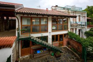 an aerial view of a house with a balcony at Casa Bruna - 100m dal Lago Maggiore in  Monvalle 