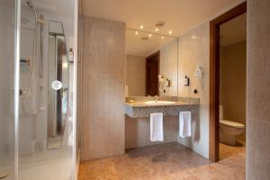 Koupelna v ubytování Hotel Cervol