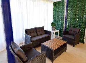 Posezení v ubytování Zama Hotel