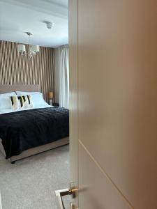 Letto o letti in una camera di The Monks Quarters