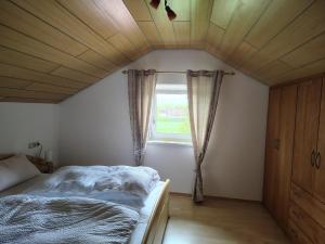 Postel nebo postele na pokoji v ubytování InnLiebe