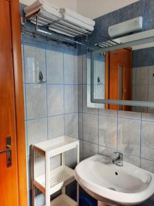 Ванная комната в Amarildo Hotel +37 фотографий