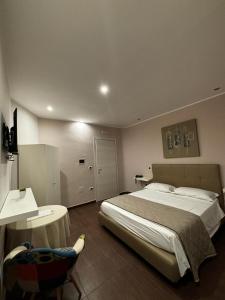 Postel nebo postele na pokoji v ubytování hotel glem