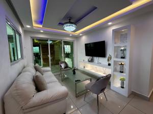 TV a/nebo společenská místnost v ubytování Casa con jacuzzi