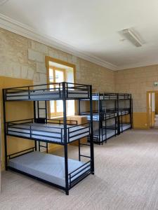 Ένα ή περισσότερα κρεβάτια σε δωμάτιο στο Auberge des Hirondelles