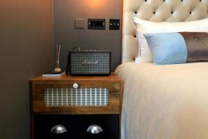 Cama o camas de una habitación en Charm Flats