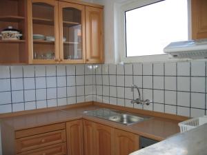 Kuchyň nebo kuchyňský kout v ubytování Family Hotel Verona
