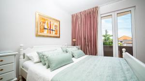 Postel nebo postele na pokoji v ubytování Villa Rustica Dalmatia + 37 fotografií