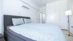 Ένα ή περισσότερα κρεβάτια σε δωμάτιο στο Michelle Apartment