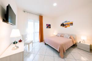 Tempat tidur dalam kamar di Villa San Lorenzo