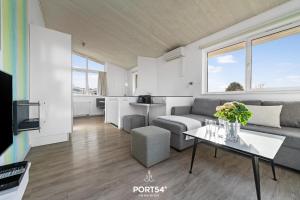 Et tv og/eller underholdning på Ferienhaus Lagunenblick 42 Marina Wendtorf