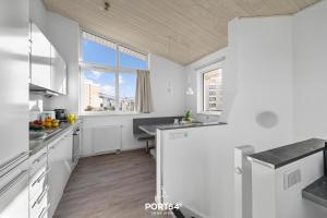 Køkken eller tekøkken på Ferienhaus Lagunenblick 42 Marina Wendtorf