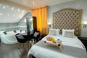 Postel nebo postele na pokoji v ubytování Hotel Melthon Class