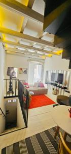 TV a/nebo společenská místnost v ubytování Leoncorno la Marina