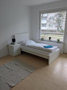 Katil atau katil-katil dalam bilik di Werkswohnung im Herzen Elmshorns