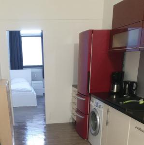 Kuchyň nebo kuchyňský kout v ubytování Itzehoe Liethberg Apartment W404