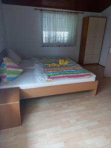 Postel nebo postele na pokoji v ubytování Apartment Zorec