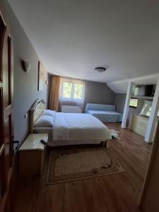 Postel nebo postele na pokoji v ubytování Casa de vacanta Isabelle