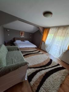 Postel nebo postele na pokoji v ubytování Casa de vacanta Isabelle + 14 fotografií