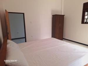 Ein Bett oder Betten in einem Zimmer der Unterkunft Vimara