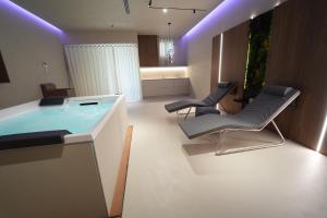 Posezení v ubytování La Scordata Luxury Apartment & Private Spa