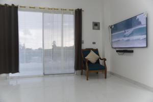 TV/trung tâm giải trí tại Apartamento Ciudad Del Surf Montañita