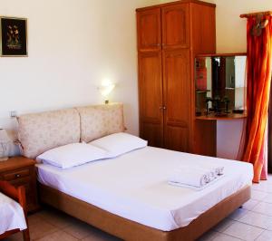 Posteľ alebo postele v izbe v ubytovaní Dimitra Rooms