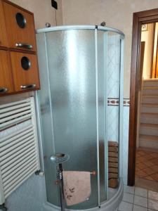 a shower with a glass door in a bathroom at Casa Sandra in Montegrotto Terme +2 photos