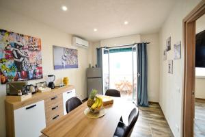 Kuchyň nebo kuchyňský kout v ubytování Isula SeaView Apartments