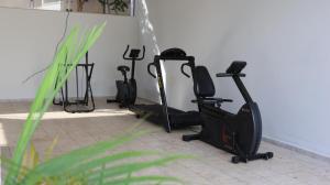 a group of exercise bikes in a room at Valentim Palace Hotel in Valentim Gentil