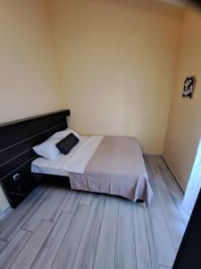 Кровать или кровати в номере Apartment 4D