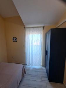 Кровать или кровати в номере Apartment 4D