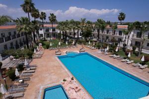 an overhead view of a swimming pool at a hotel at Loutsiana Deluxe Apts in Ayia Napa