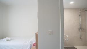Koupelna v ubytování Hostal Calaya