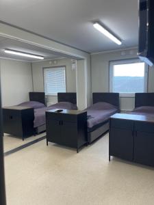 Postel nebo postele na pokoji v ubytování Pabrades Apartamentai