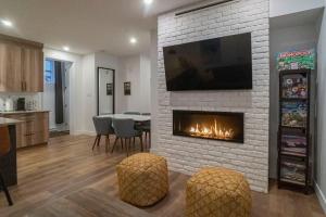 Μια τηλεόραση ή/και κέντρο ψυχαγωγίας στο Most beautiful condo 101 in Bromont Vieux