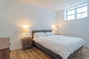 Ένα ή περισσότερα κρεβάτια σε δωμάτιο στο Most beautiful condo 101 in Bromont Vieux +53 φωτογραφίες