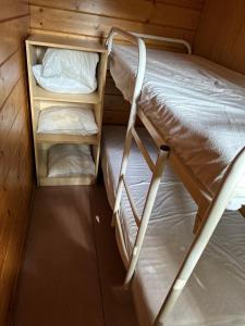 Postel nebo postele na pokoji v ubytování Groenpark