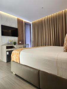 Hotel y Cabañas Covemar客房内的一张或多张床位
