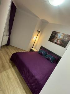 Postel nebo postele na pokoji v ubytování Jokica apartmani