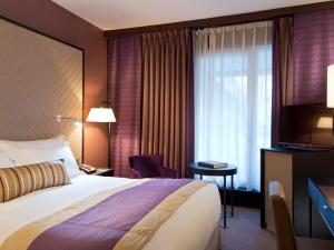 Postel nebo postele na pokoji v ubytování Sofitel Strasbourg Grande Ile + 37 fotografií