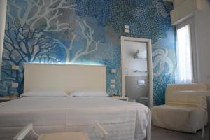 A bed or beds in a room at Daniel Apartments