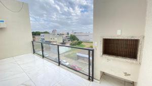 a balcony with a view of a city at HOTEL BARLOS ADUANA in Uruguaiana